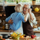 Mature couple dancing in the kitchen