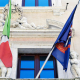 Flags on the balcony of Palazzo Sardagna