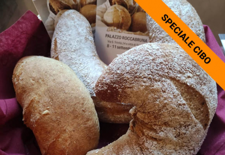 La riproduzione del pane preistorico di Ledro © Assia Kysnù Ingoglia