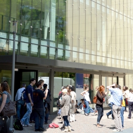 group of students in front of the university entrance