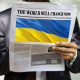 article headlines "the world will now change", Ukrainian flag on front page