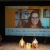 Sorridente Ilaria Capua in videoconferenza su maxischermo al Teatro Sociale
